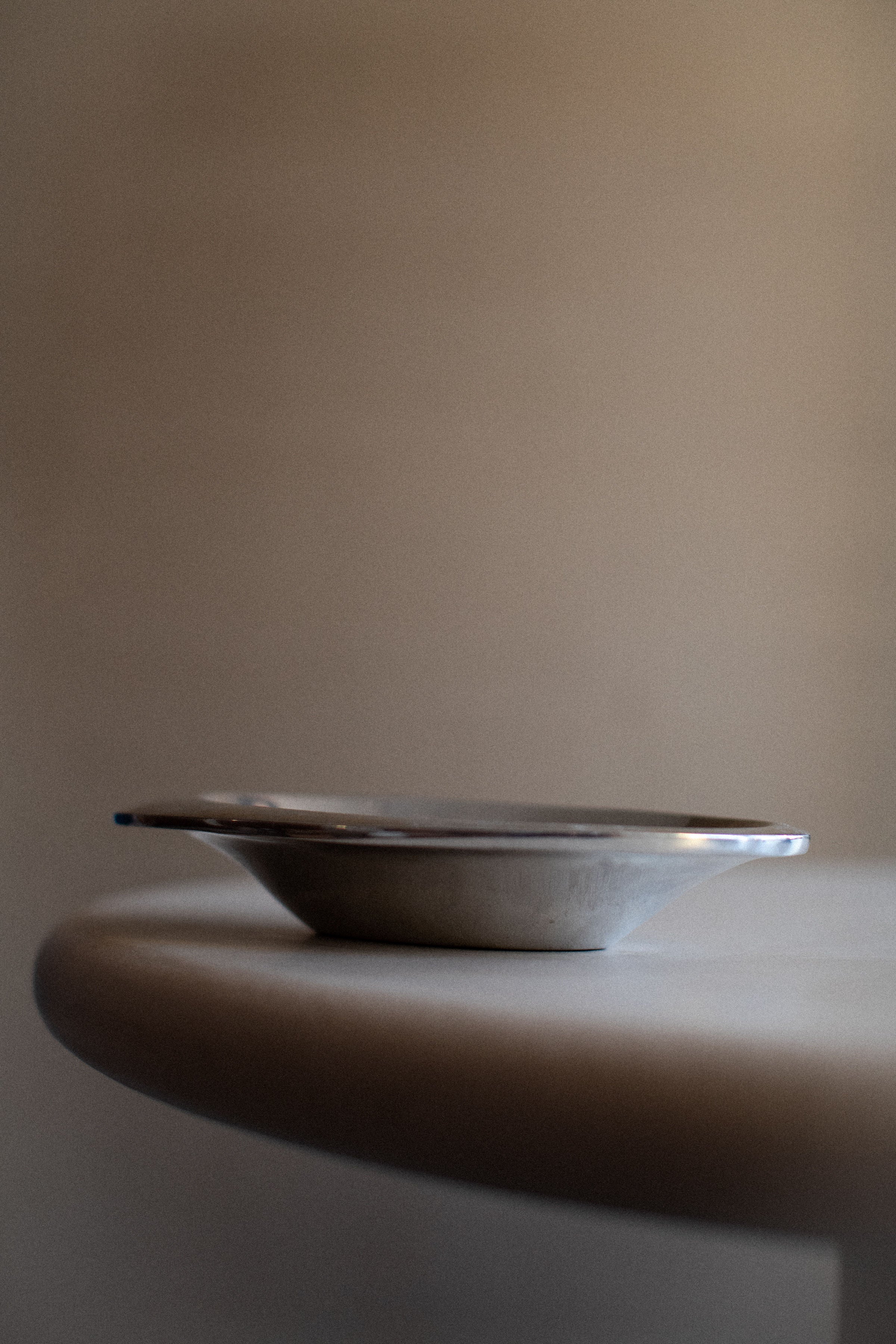 Round Chrome Bowl with decorative embossed pattern and lustrous finish