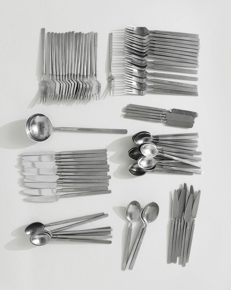 Modern stainless steel flatware set with geometric handles by Erik Herløw