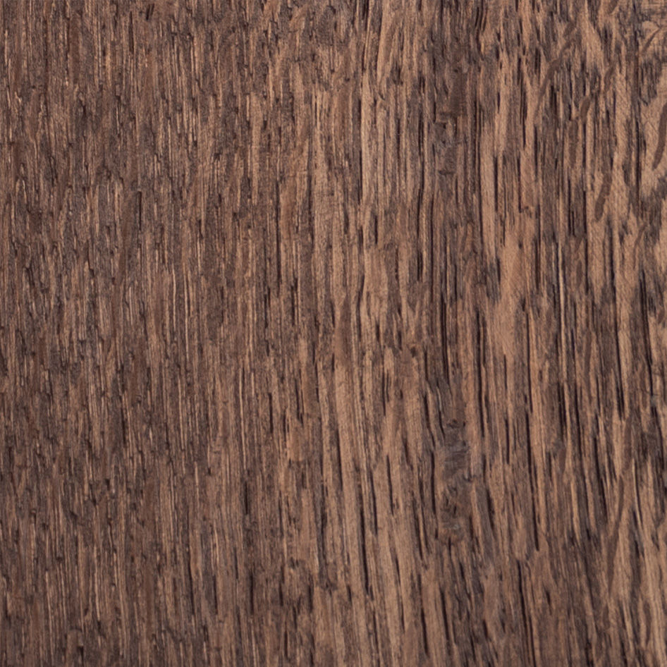 Close-up of a natural wood texture with a rough, grainy surface in various shades of brown. Much like the Paris Dining Table by ASERIES OF OBSTACLES, SL, it features irregular patterns and markings that showcase its organic structure, ideal for social gatherings.