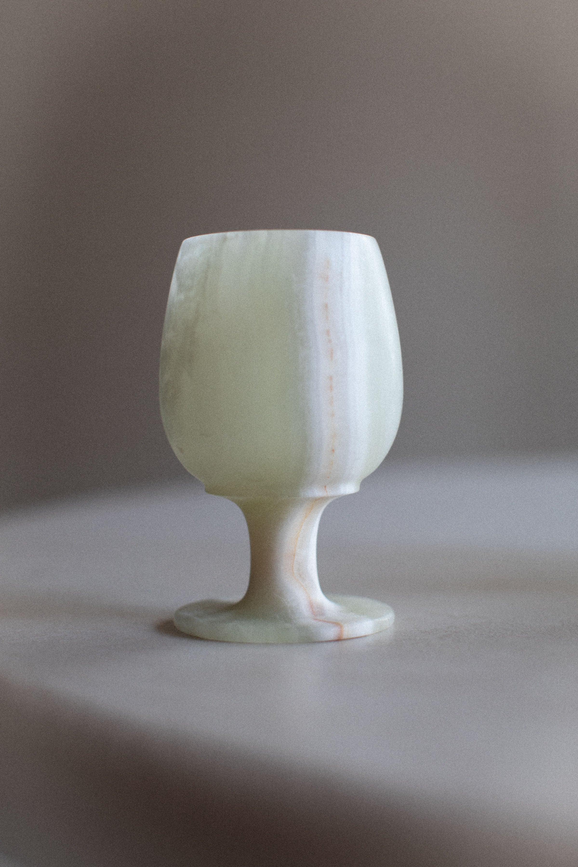 Handcrafted marble cups set featuring unique natural patterns and smooth finish