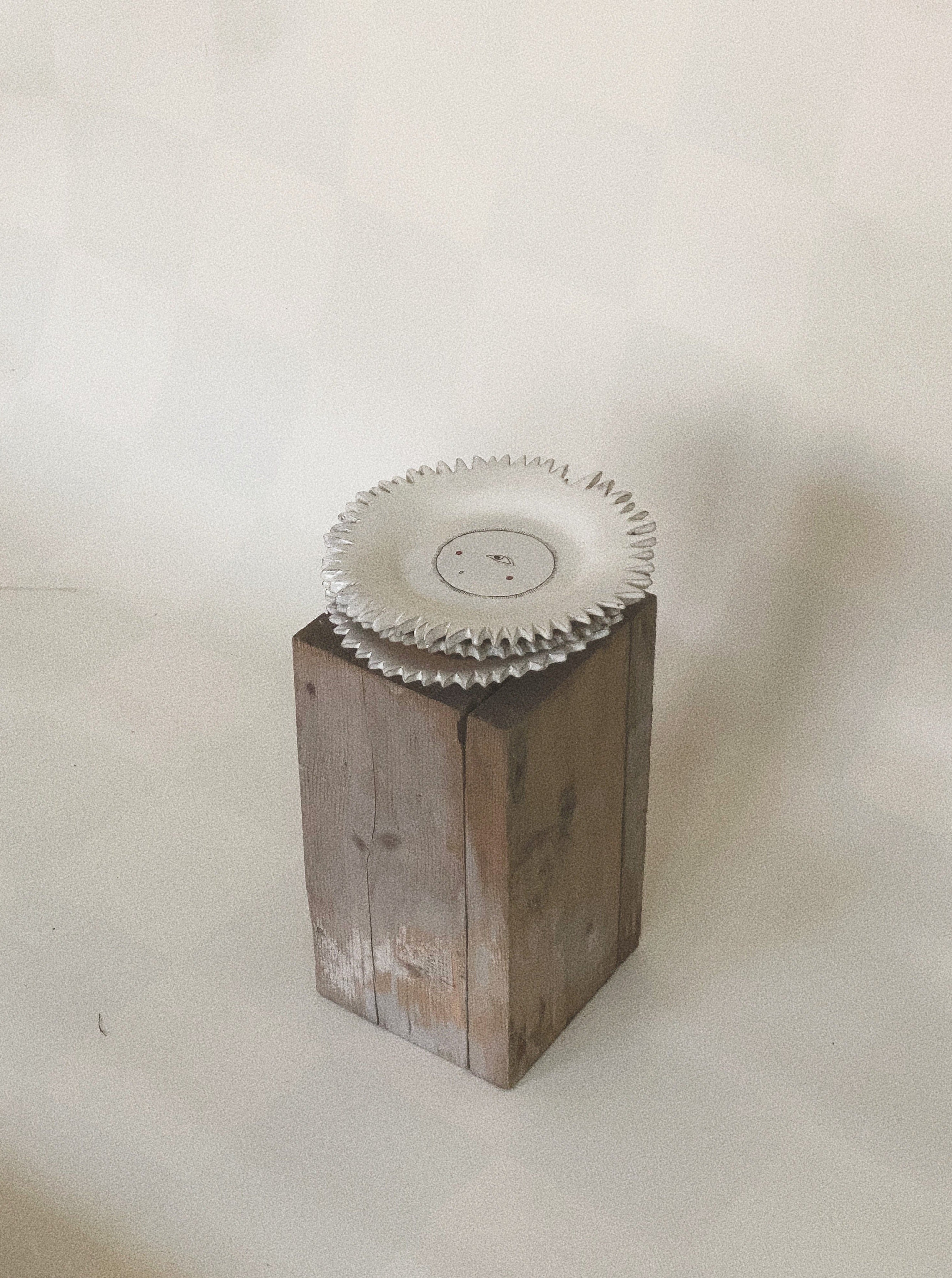 Round ceramic sun plate with hand-painted sunflower design, perfect for serving food