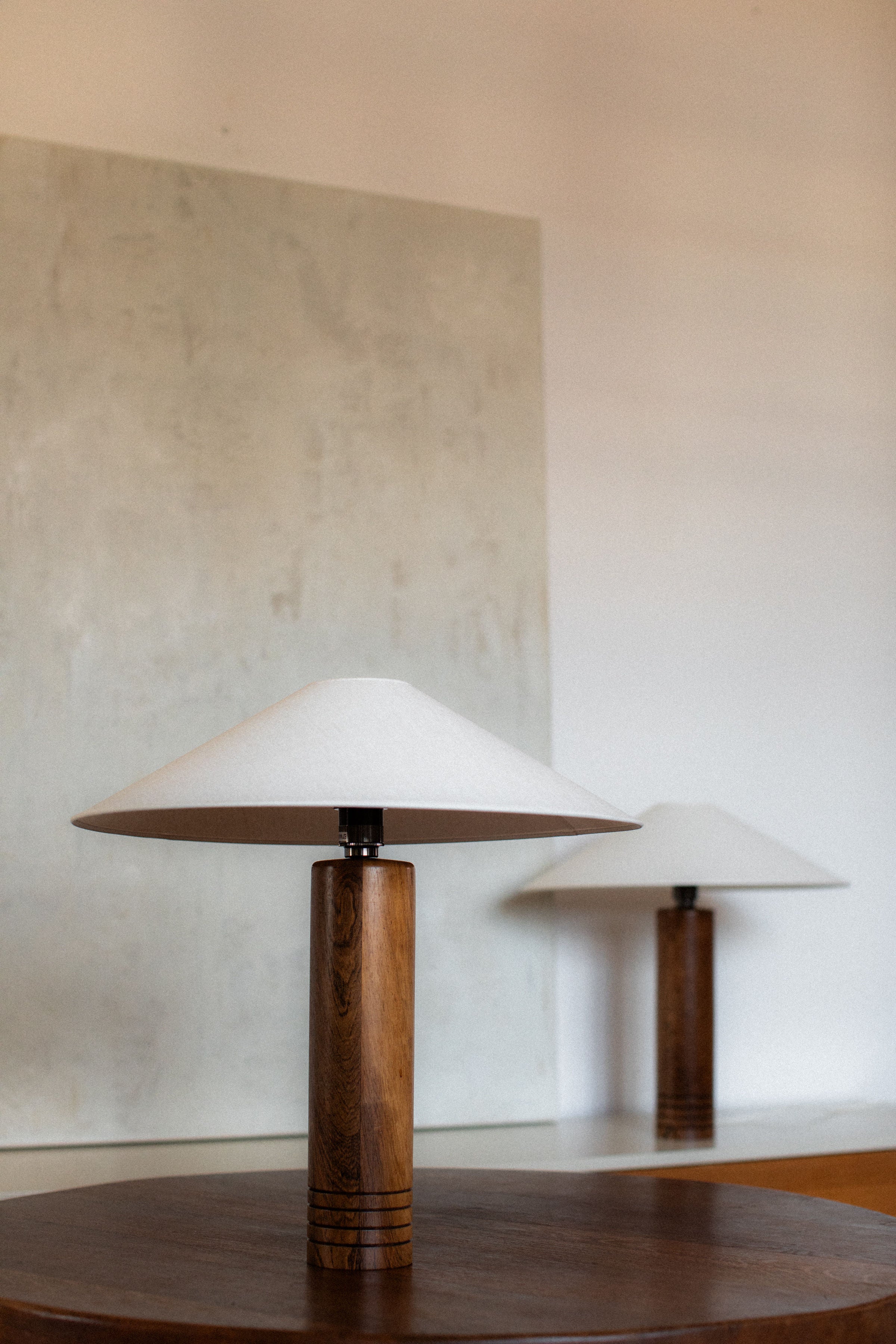 Pair of 1960s wooden table lamps with conical white shades