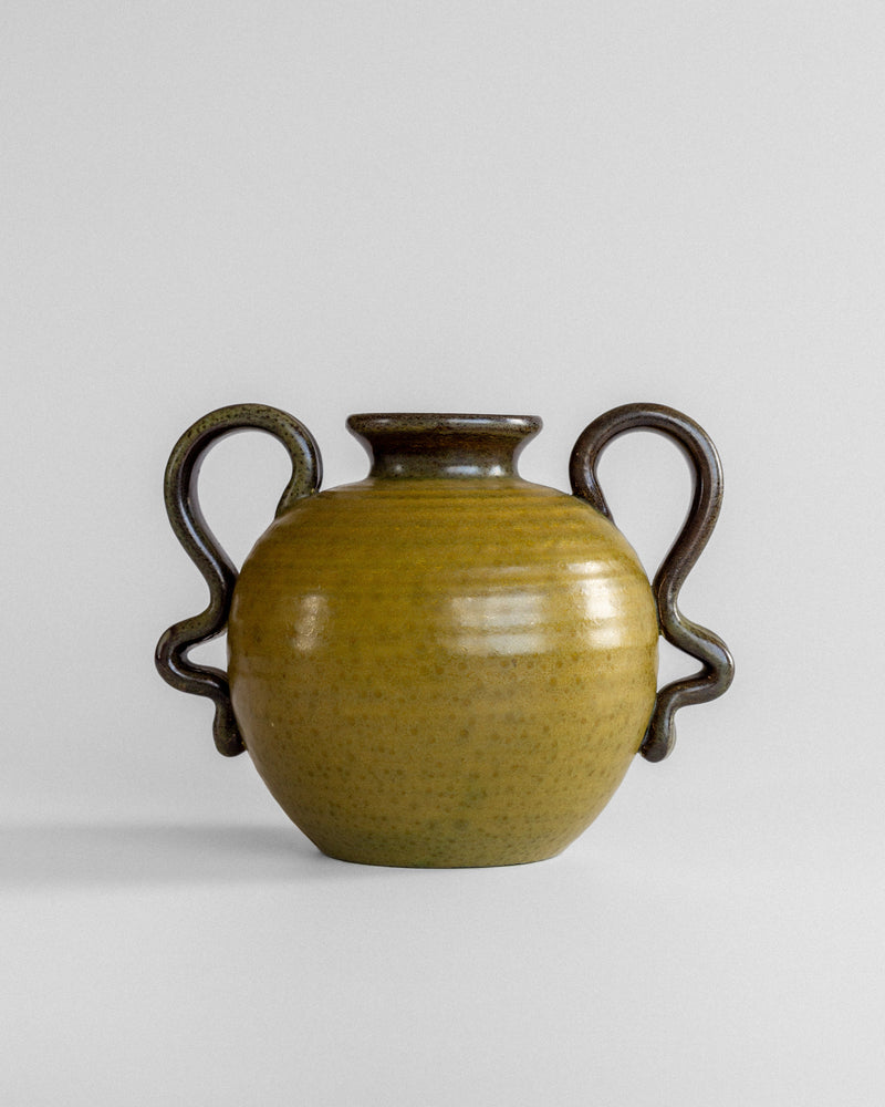 Yellow ceramic vase with serpentine handles by Eva Jancke-Bjork