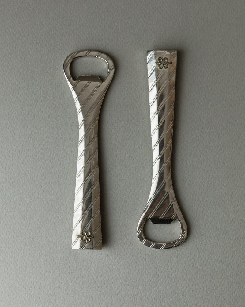 Set of two vintage silver-plated bottle openers with etched pattern