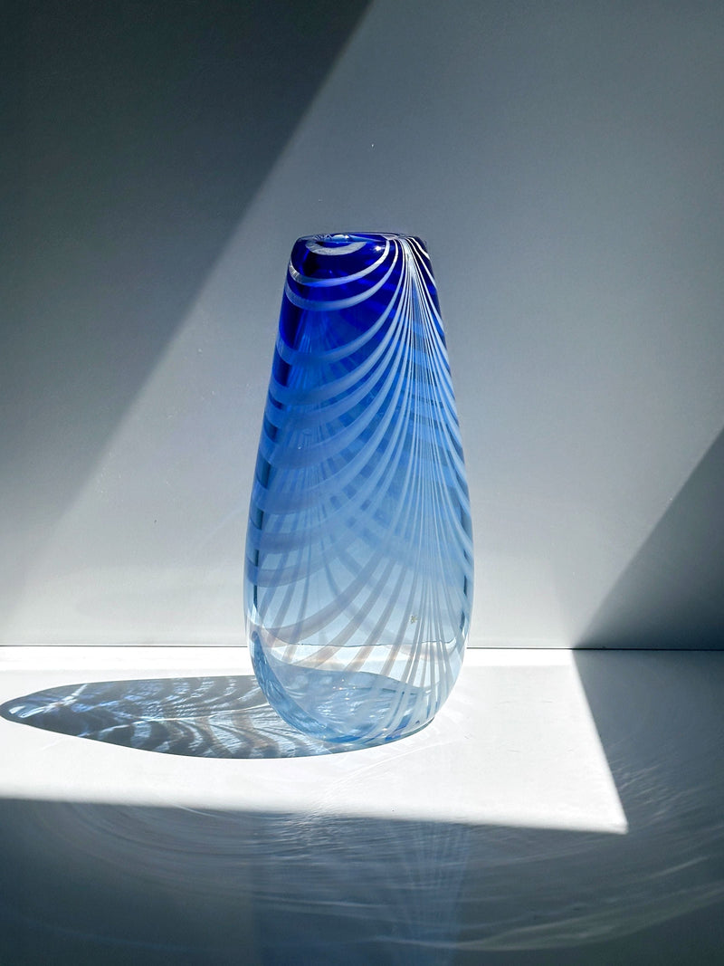 Blue Bohemian art glass vase with spiral ribbed pattern detail