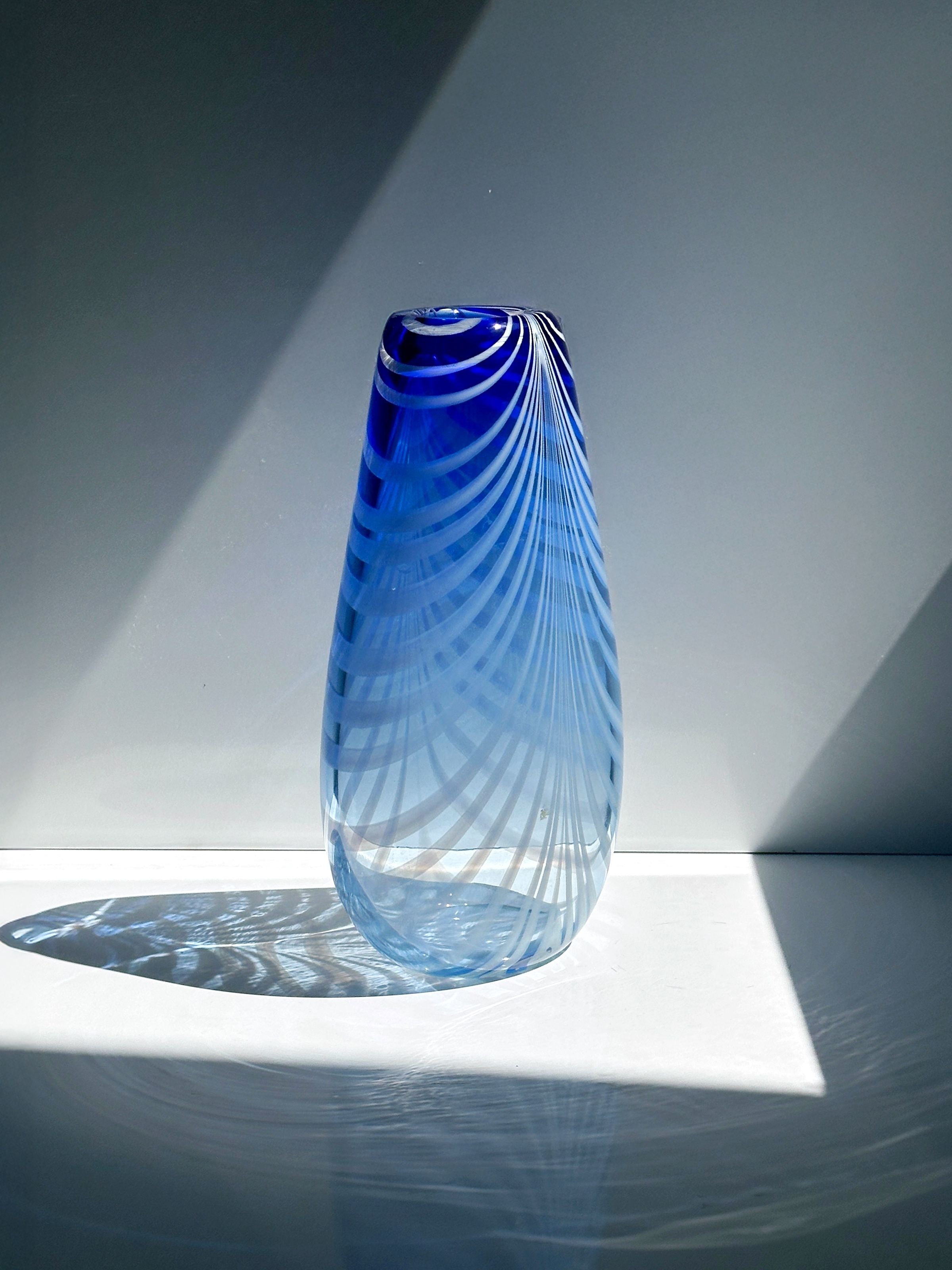 Blue Bohemian art glass vase with spiral ribbed pattern detail