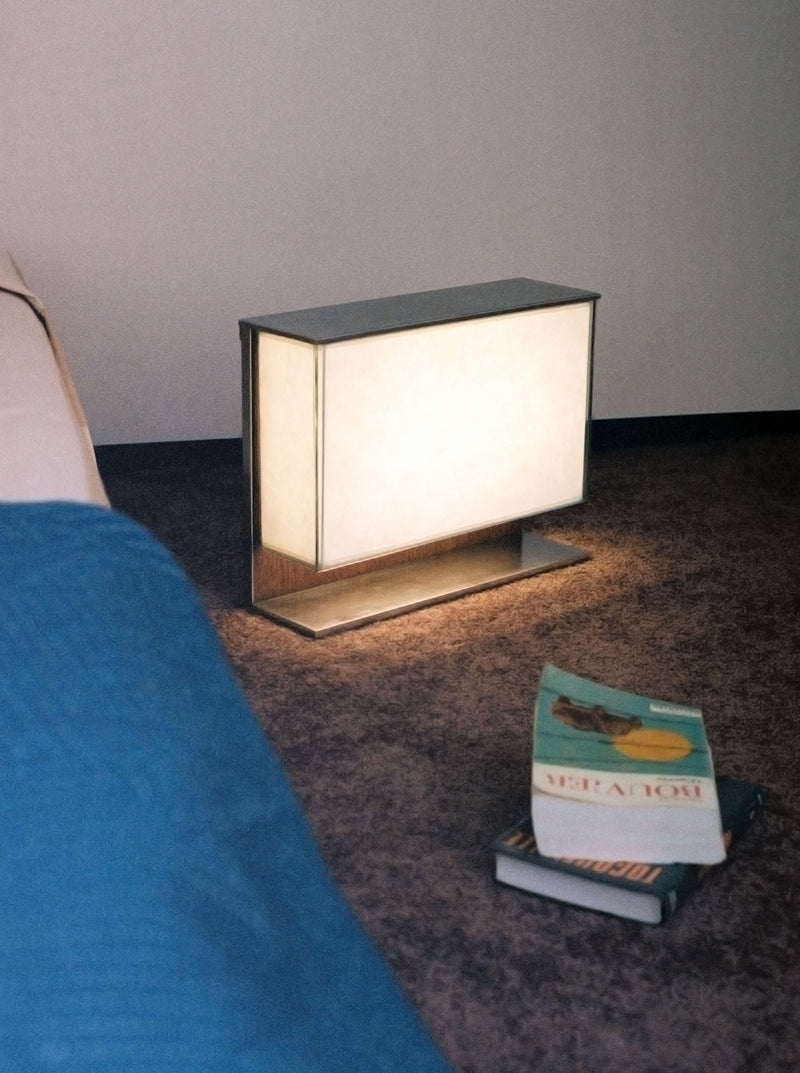 Table Light 2022, an energy-efficient LED lamp with touch-sensitive controls and flexible arm for customized illumination angles