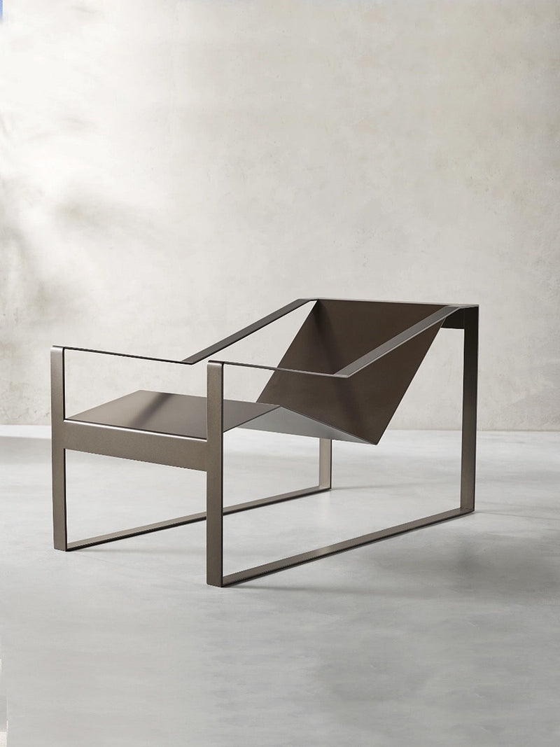 Modern geometric lounge chair with angular metal frame design