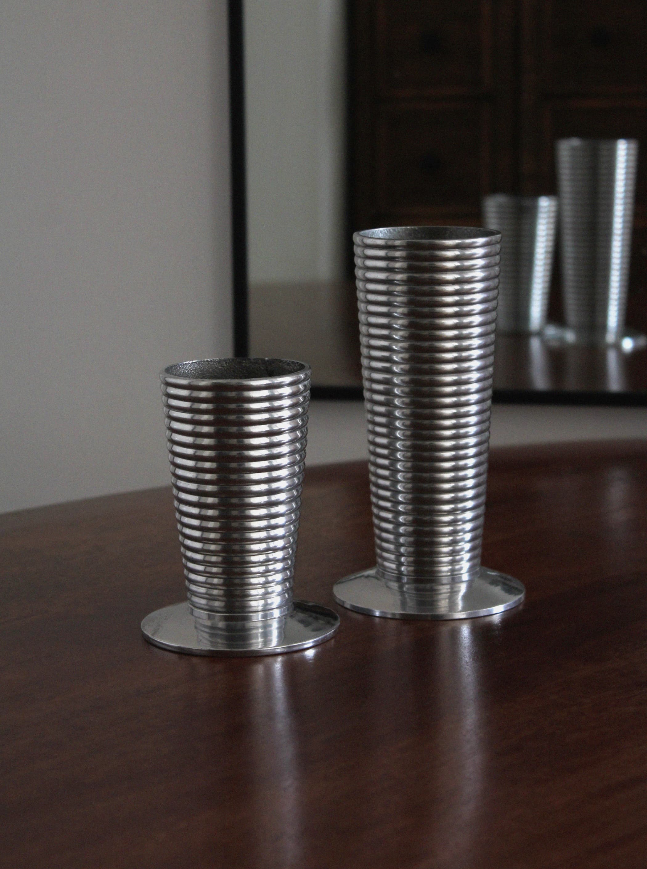 Pair of Aluminum Vases