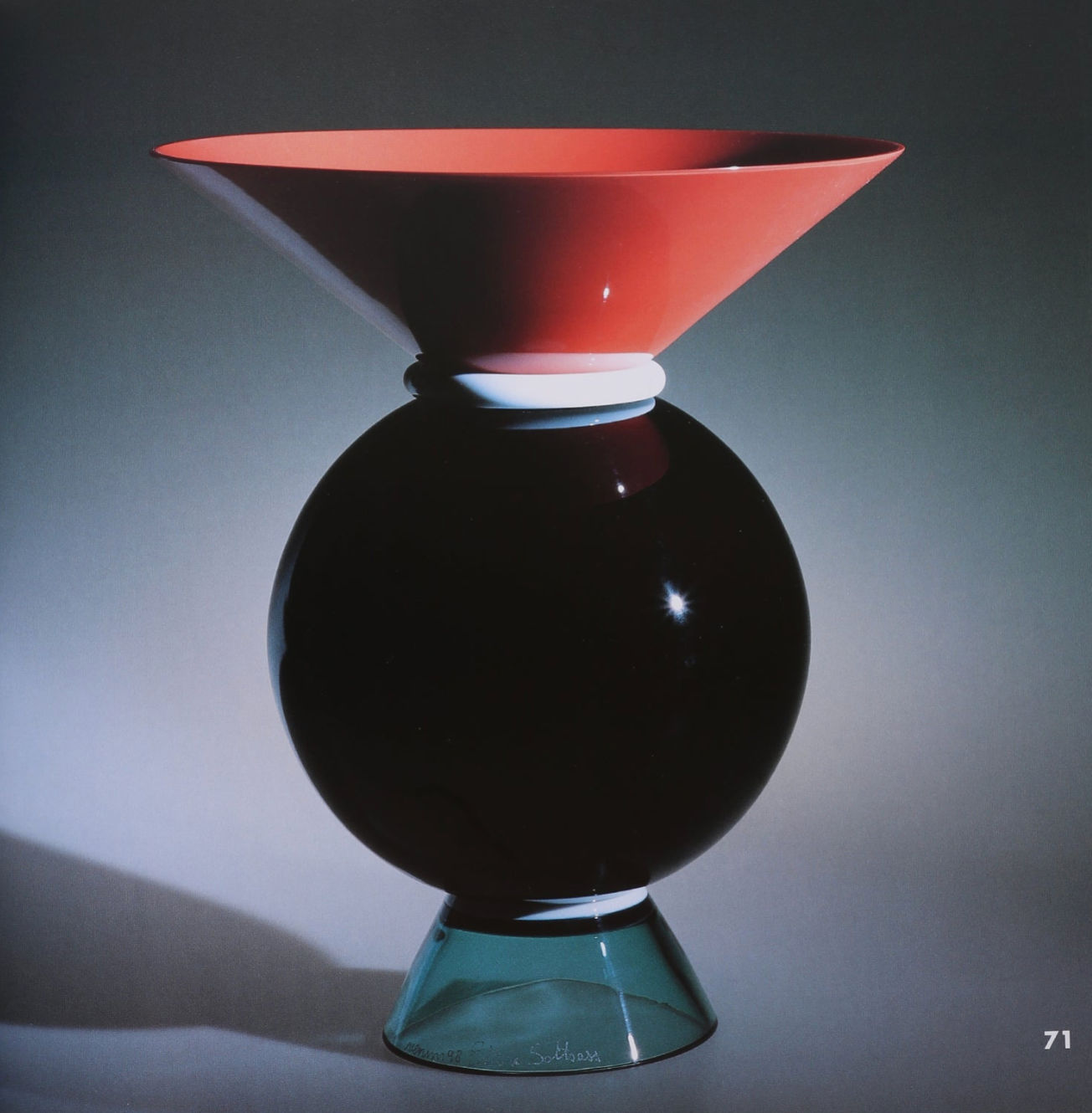 The Villa "Ettore Sottsass, Glass Works Book" is shown with a modern vase design—wide red flared top, black spherical middle, small transparent blue cone base—against a gradient background. The number 71 is in the lower right corner.