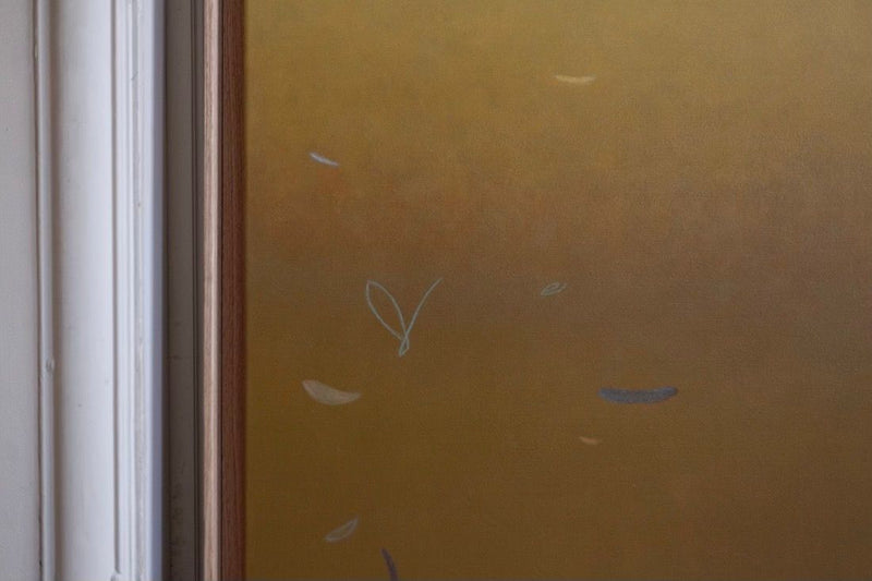 The 'Morning Hue' Painting by Rebecca von Matérn features a seamless gradient from light brown to mustard yellow. Subtle, abstract lines and shapes grace the surface, with a white vertical line on the left acting as a shadow frame.