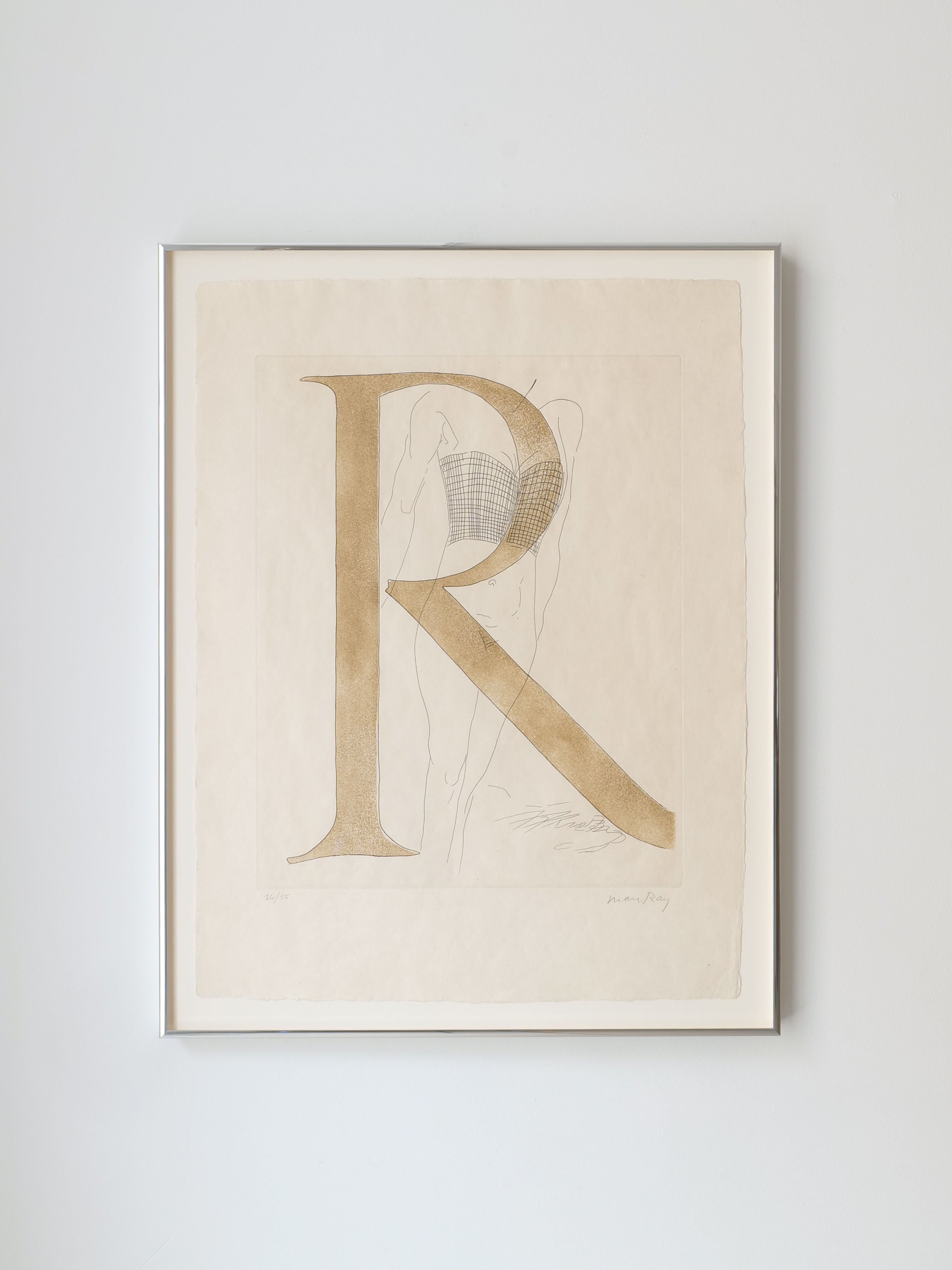 The Man Ray Etching 'Renee' 1970 from Collection apart showcases a large, stylized brown "R" on a light background, echoing Surrealist photography. Subtle abstract shapes enhance its intrigue. This limited numbered piece is mounted in a simple white frame.