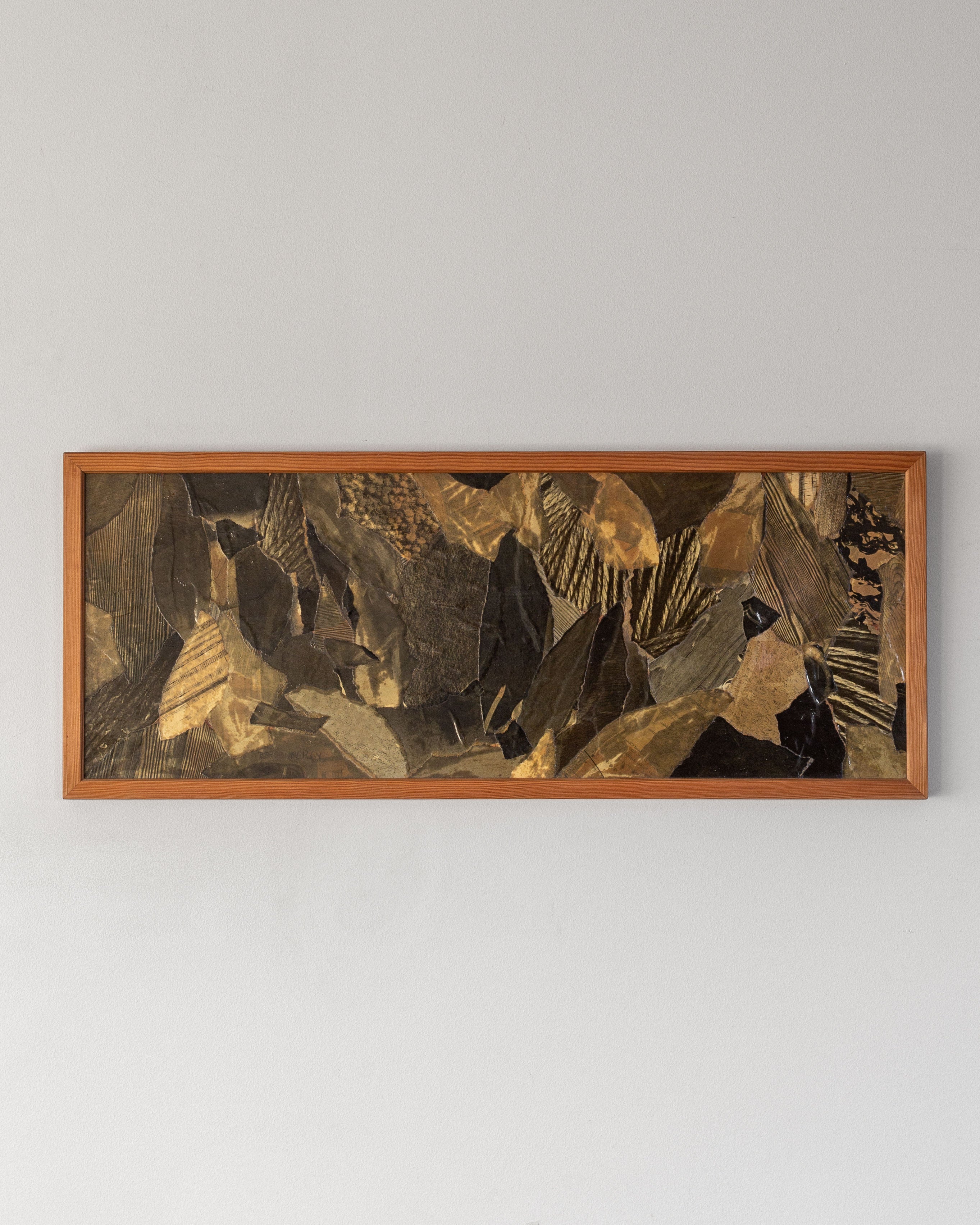 The "Leaves" artwork by Lars Bergander, a 1960s abstract collage from Sweden under the Spigel brand, features earthy tones and angular, textured shapes reminiscent of geological forms. Framed in wood, it exudes a mid-century modern Scandinavian vibe on a light-colored wall.