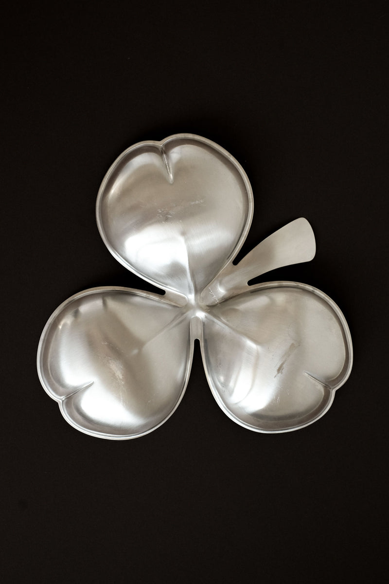Silver metal cloverleaf vide-poche bowl viewed from above