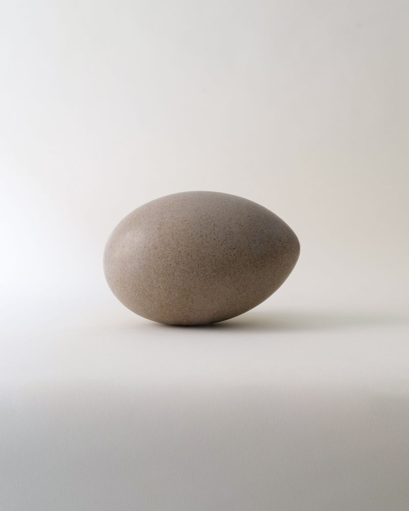 Ceramic egg sculpture in matte beige glaze by Vincent Nilsson