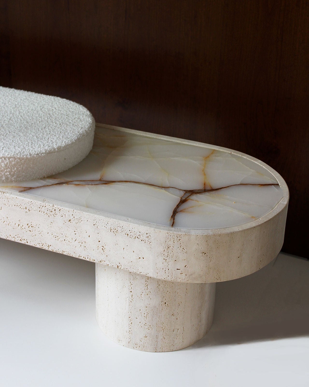 Noto travertine bench with onyx inlay detail by Marbera