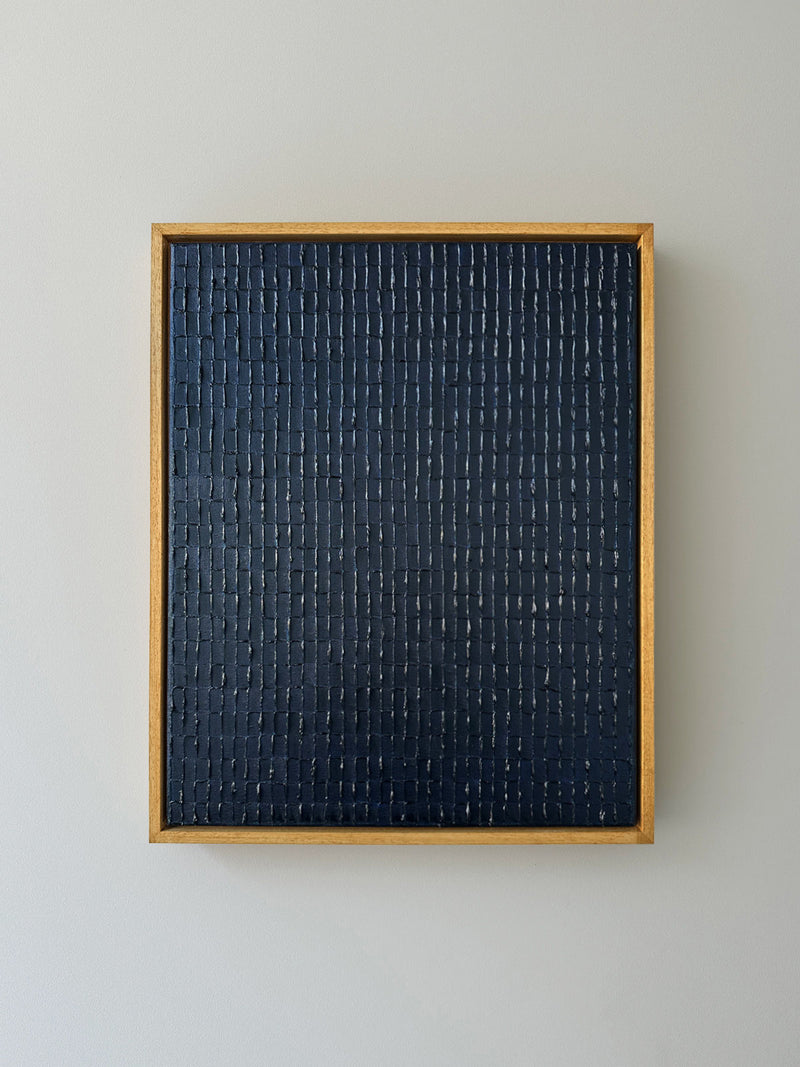Prussian blue textured abstract painting in wooden frame by Roi Elmaliah