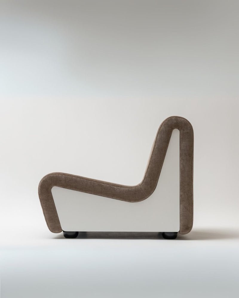 Modern fabric lounge chair with curved continuous frame profile