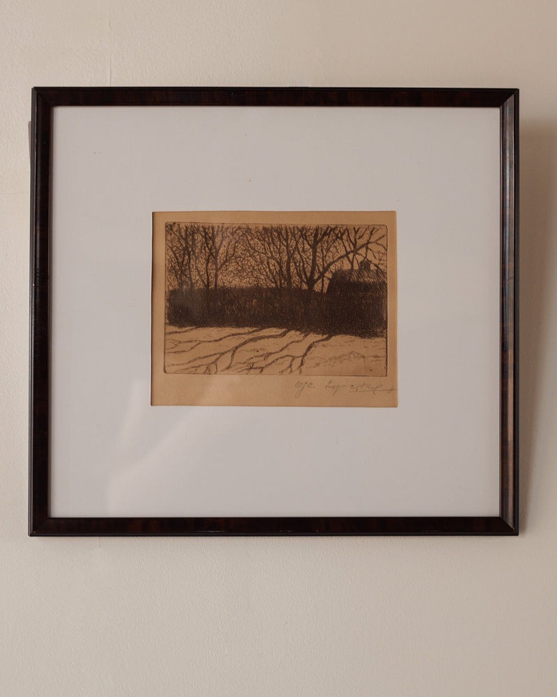 Framed Oscar Lycke etching depicting winter trees and snowy ground