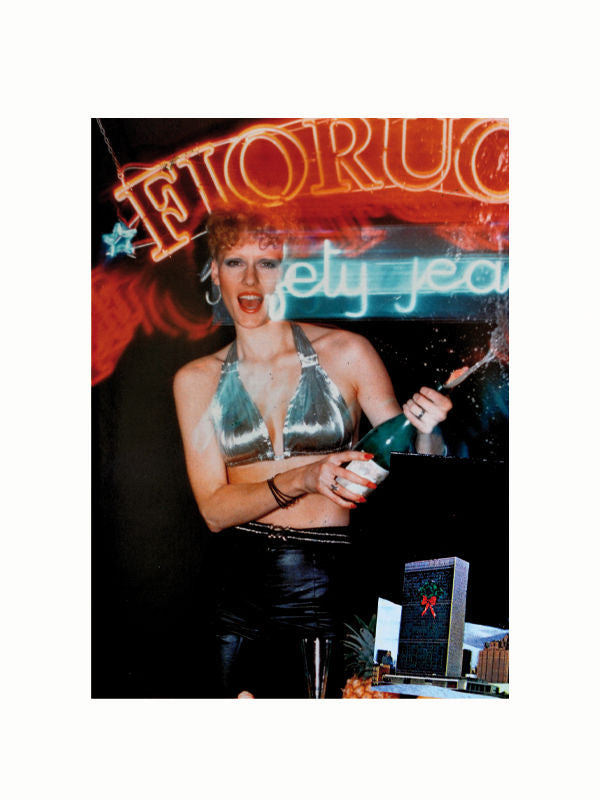 A woman dressed in a silver halter top and black leather pants is smiling while holding a Fiorucci from Maison Plage in a vibrant setting with neon signs, reminiscent of 1980s fashion. A smaller overlay image in the lower right corner features a building adorned with a large red ribbon, hinting at an iconic brand.