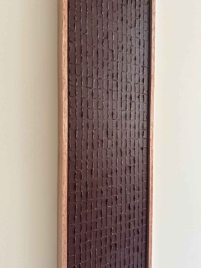 Textured brown clay surface detail of Indian Mud painting