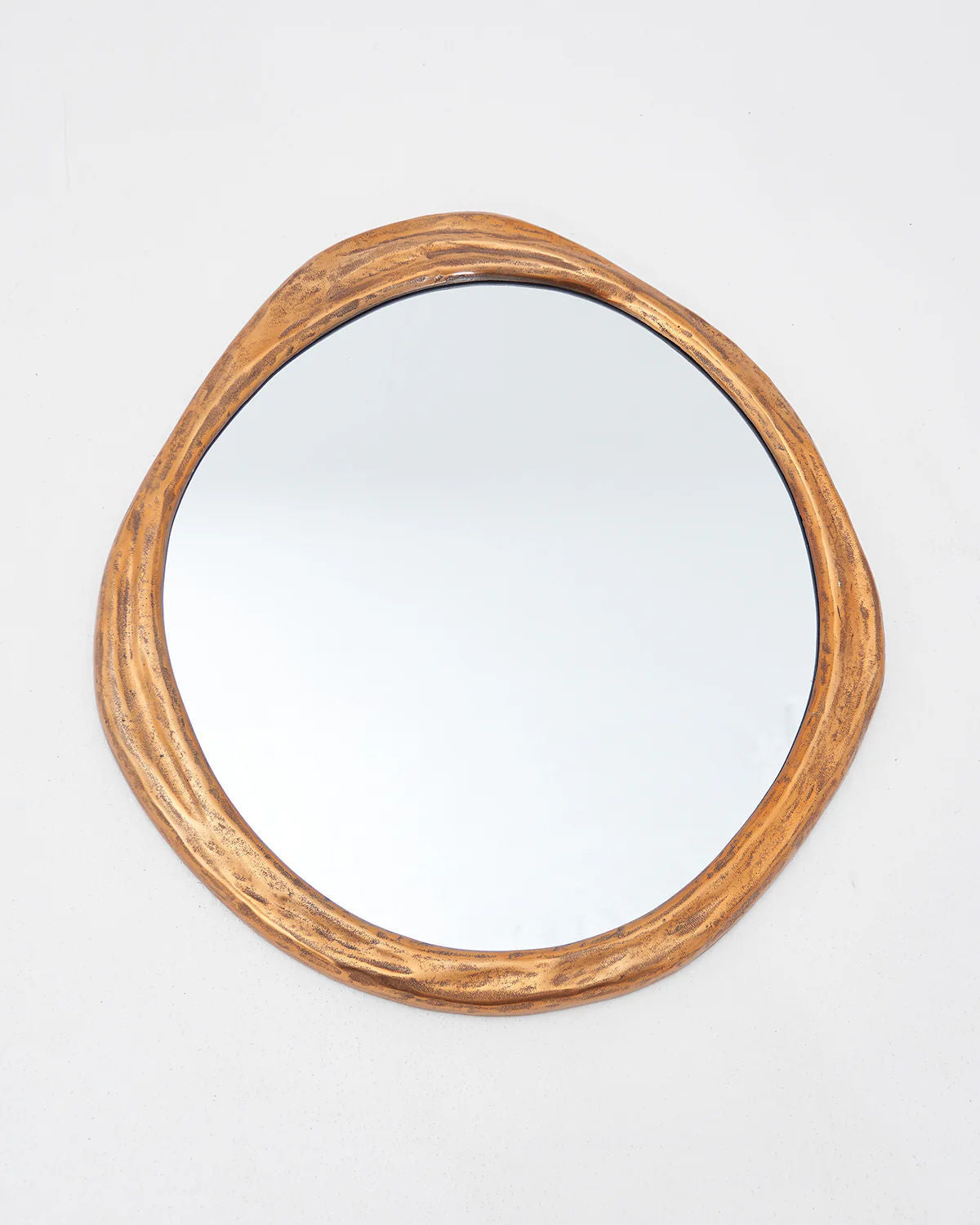 The LMNOH Rizzo Mirror combines a rustic wooden frame with modern aesthetics, set against a plain white background.