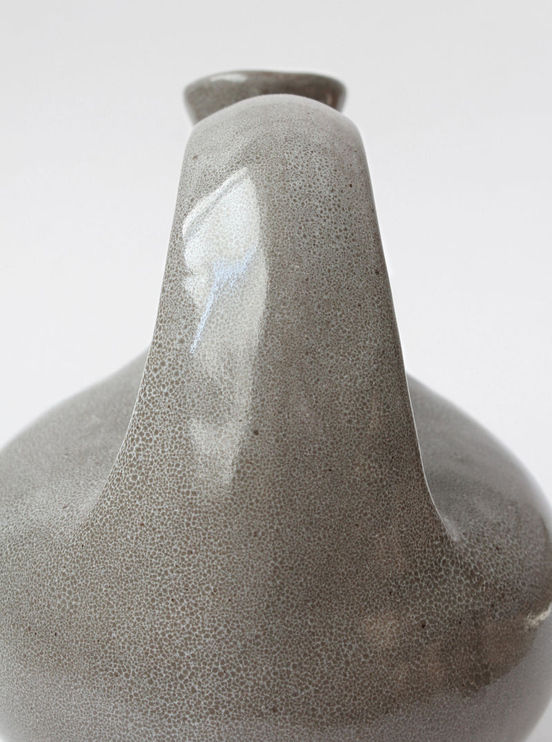 Close-up spout detail of mid-century grey ceramic jug