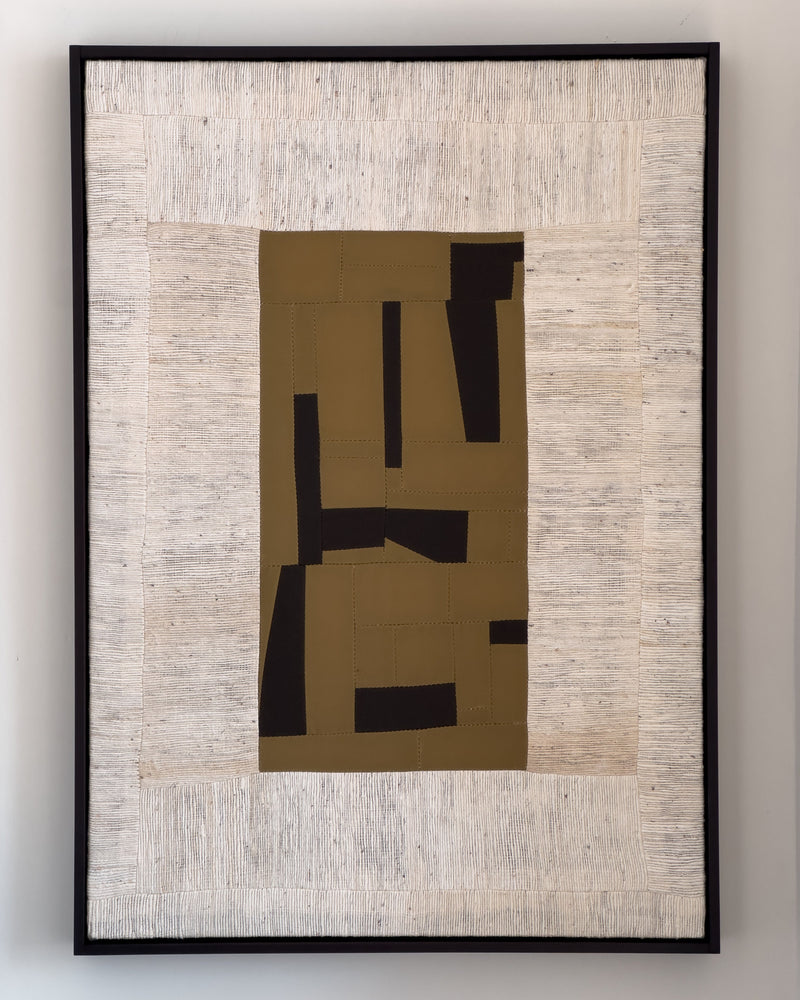 Abstract geometric composition with golden and black shapes on textured cream canvas