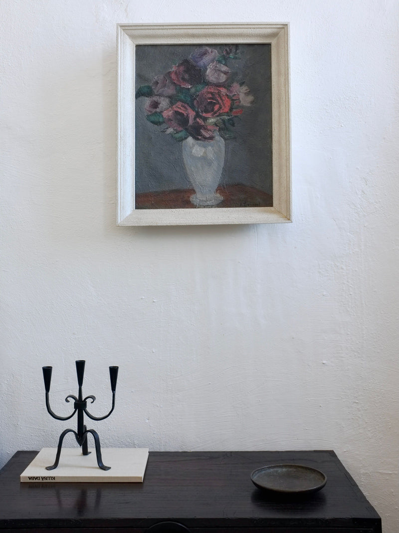 Vintage roses oil painting in ornate frame, lifestyle setting