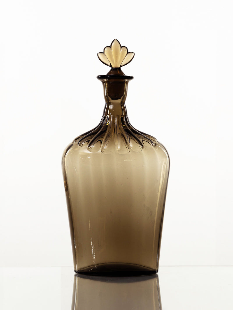 Amber glass decanter with ornate stopper by Simon Gate for Orrefors
