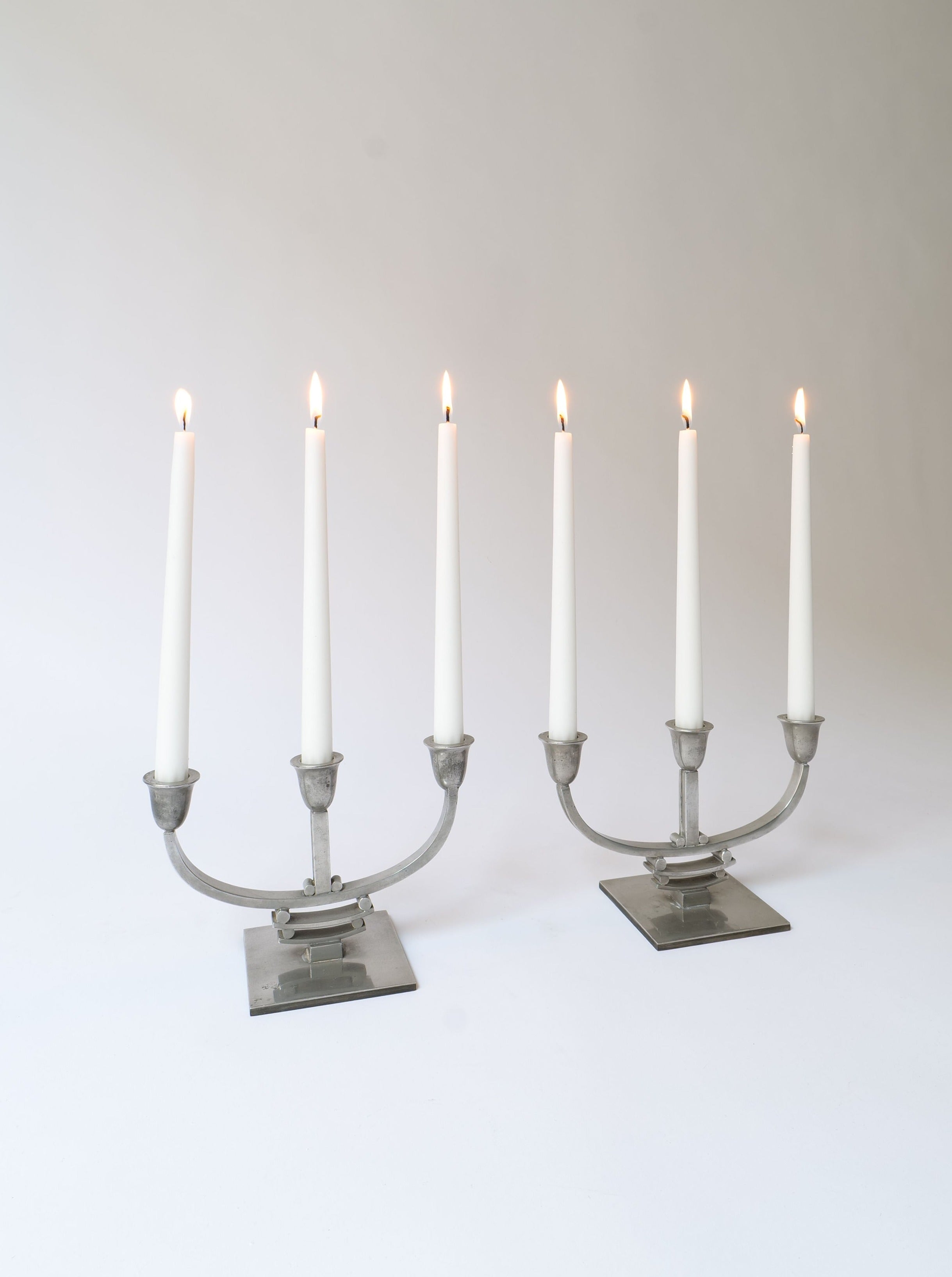 Vintage 1930s Deco Pewter Candle Holders with intricate detailing and elegant design