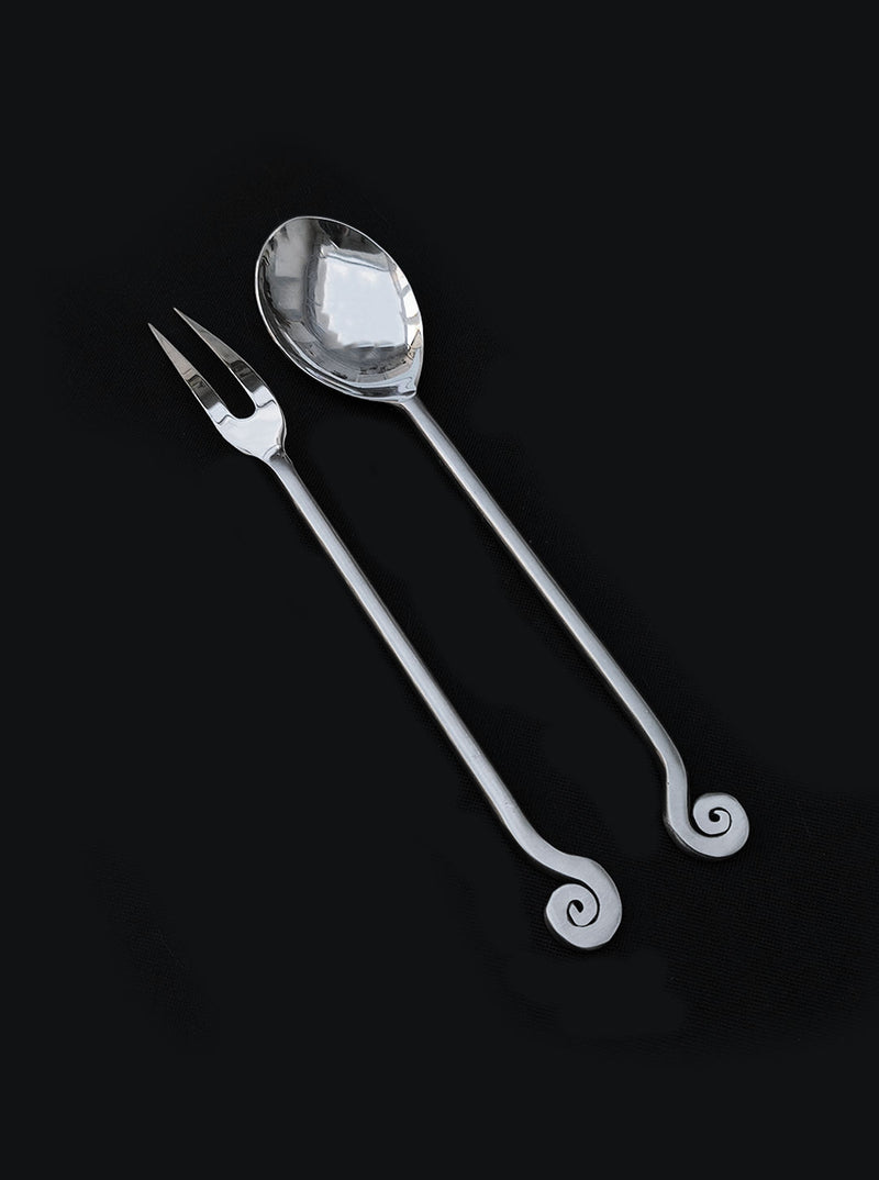Spiral-handled serving spoon and fork cutlery set detail view
