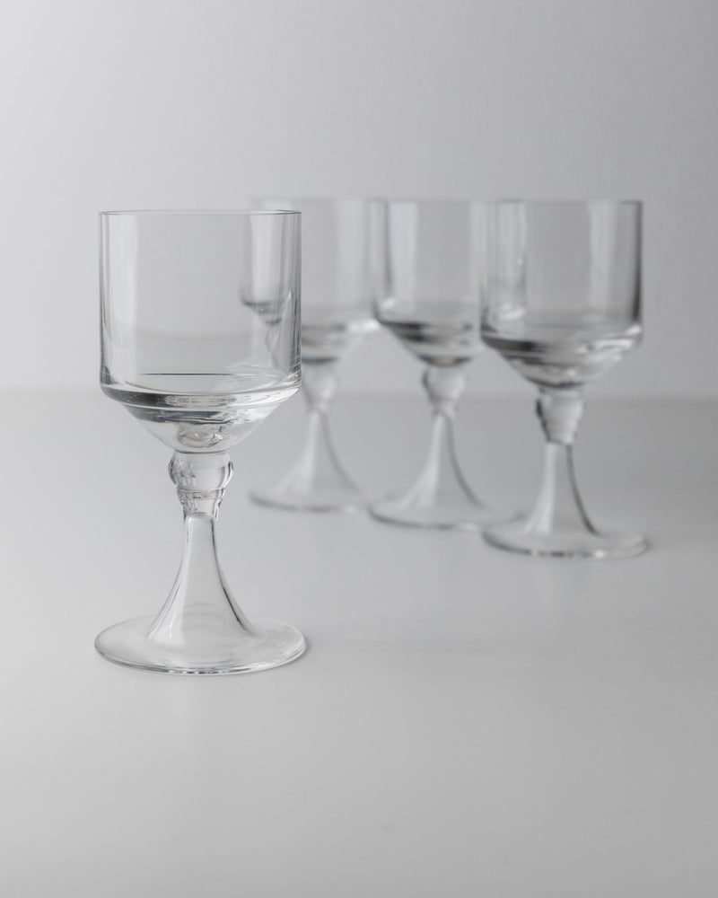 Set of four vintage Italian wine glasses with clear bowls and elegant stems from 1970s