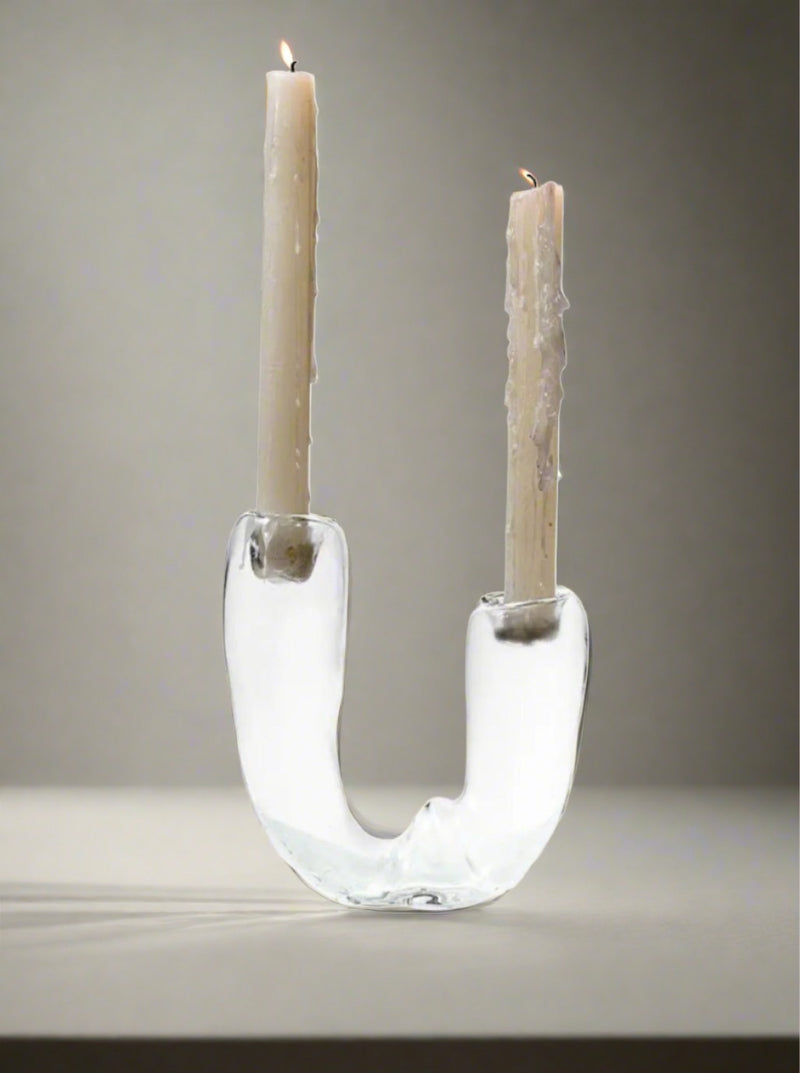 Modern black metal candle holder with a sleek and elegant design