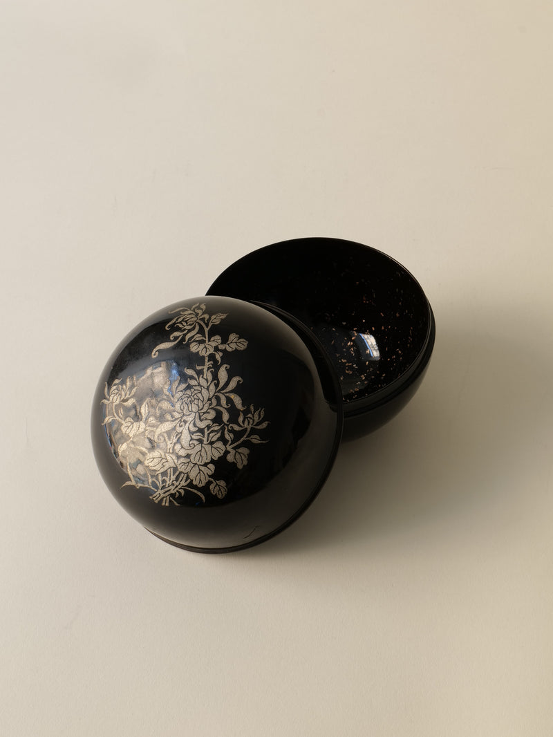 Black lacquered Art Deco box with silver floral motif, lid open