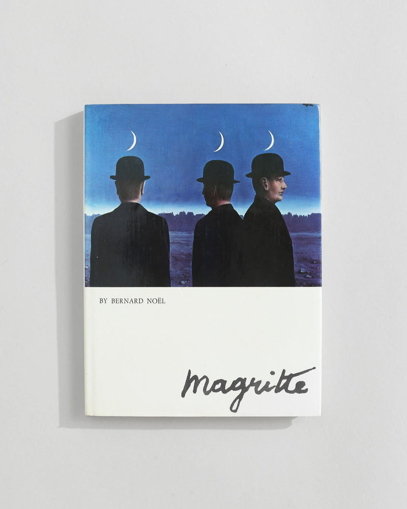 Magritte art book by Bernard Noël featuring surrealist bowler hat men