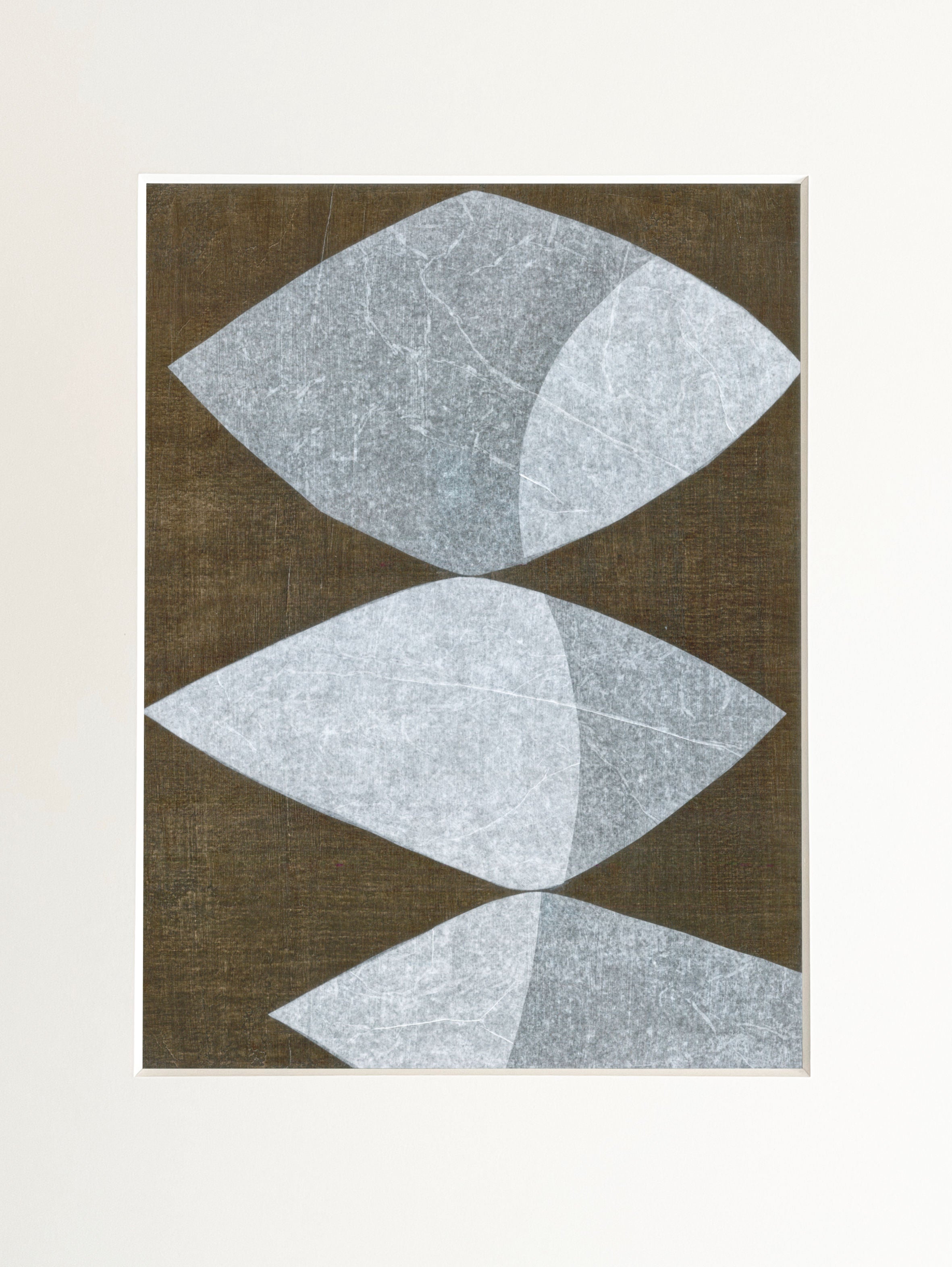 Abstract geometric mixed media artwork with three diamond shapes in blue-gray tones