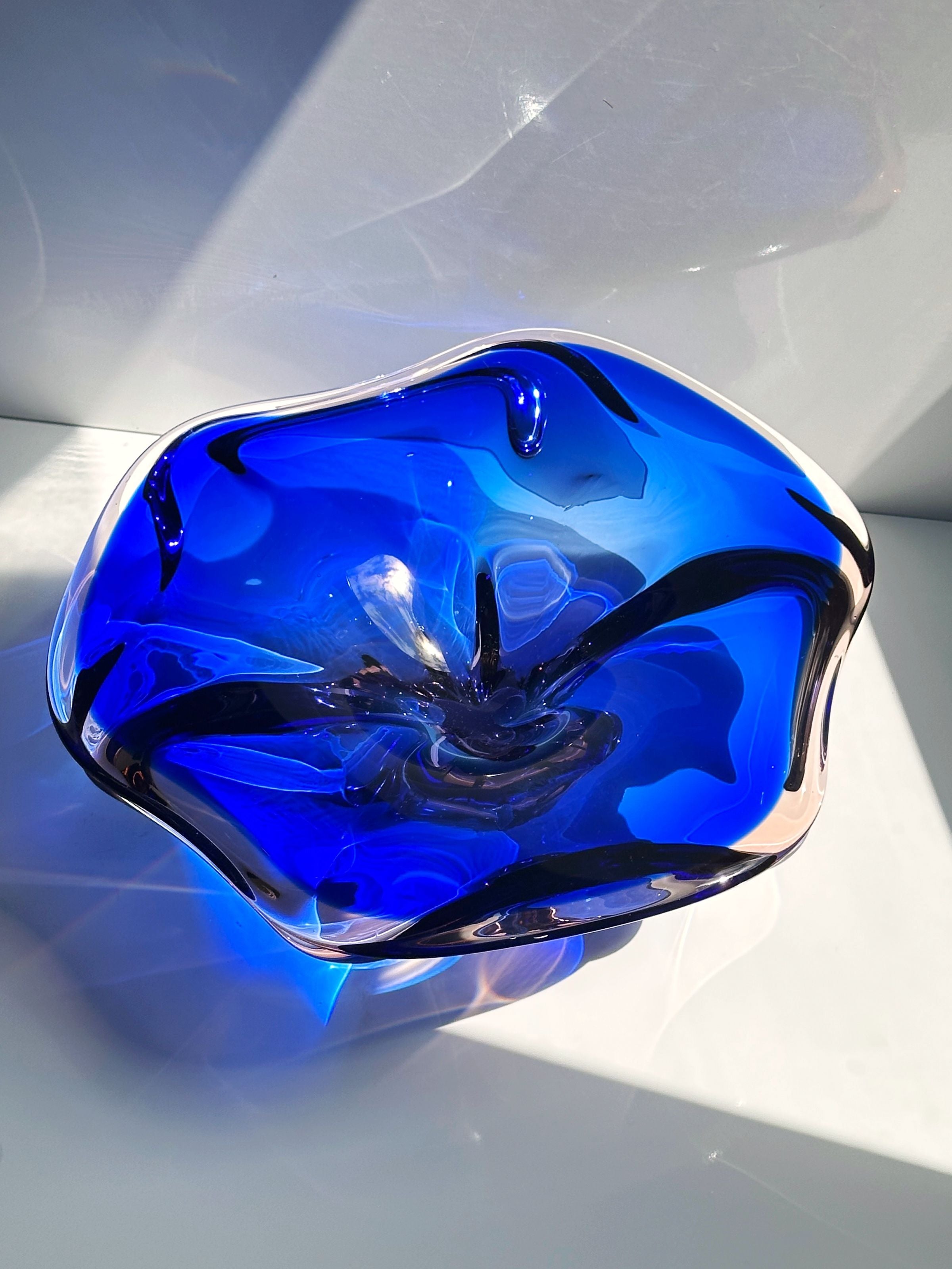 Large cobalt blue Bohemian glass bowl with swirled interior design