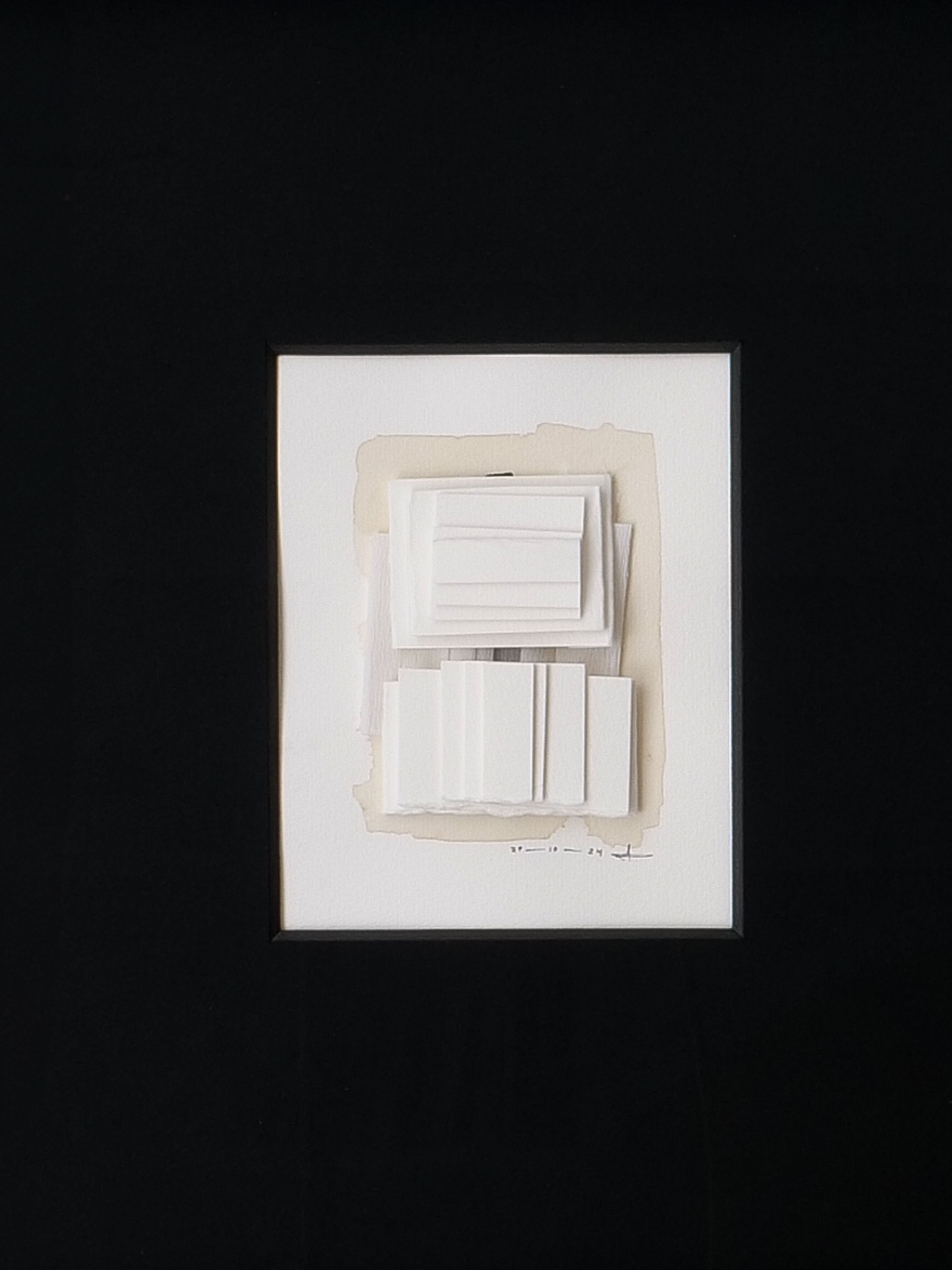 The "Collage No.03" by Rasmus Wingårdh from Collection Apart is a framed abstract artwork with layered rectangular white shapes on a light beige background, embodying minimalism and a 3D effect in a simple black frame.