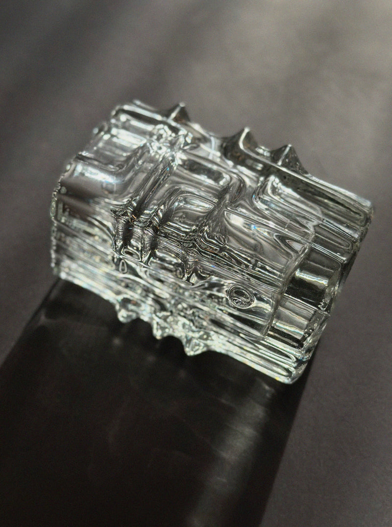 Clear ribbed glass mid-century vase showing geometric texture detail