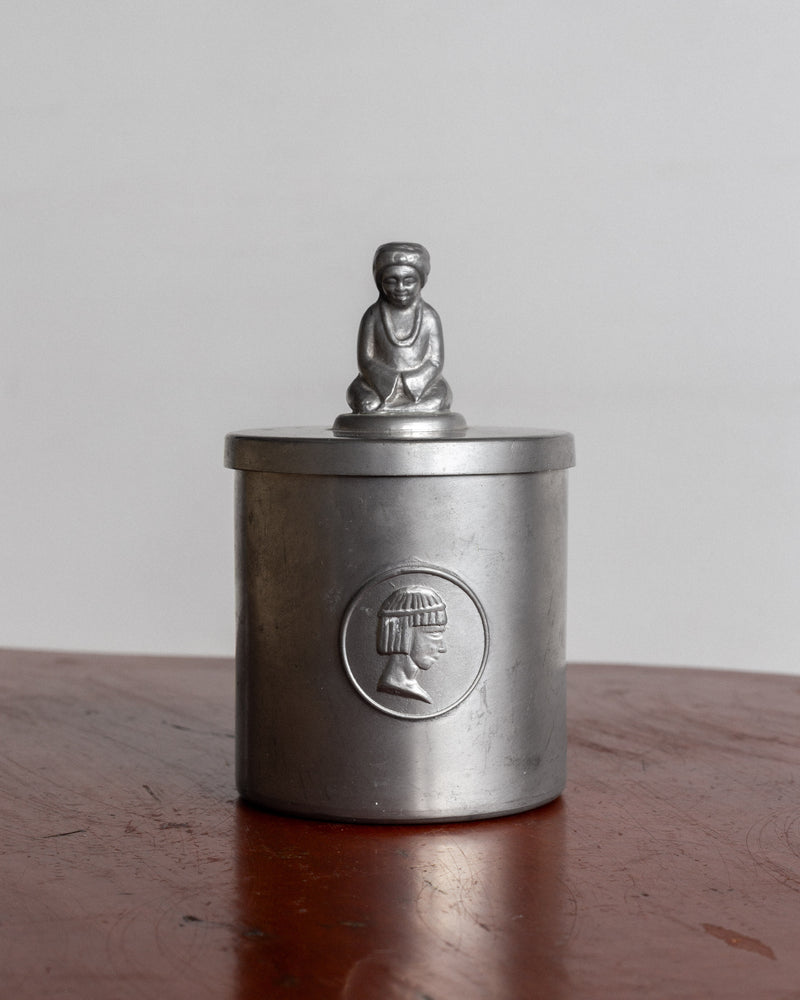 Art Deco pewter box with Egyptian Revival figure and medallion