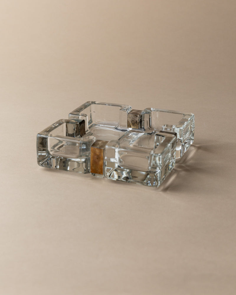 Clear glass ashtray with geometric compartments by Walther Glass