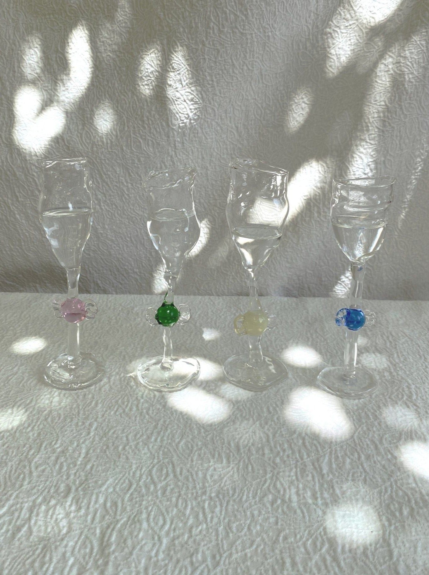 Set of stylish and colorful shot glasses for party drinks