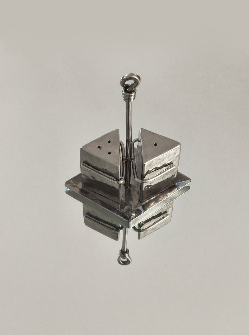 Polished chrome salt and pepper shakers with carrying handle