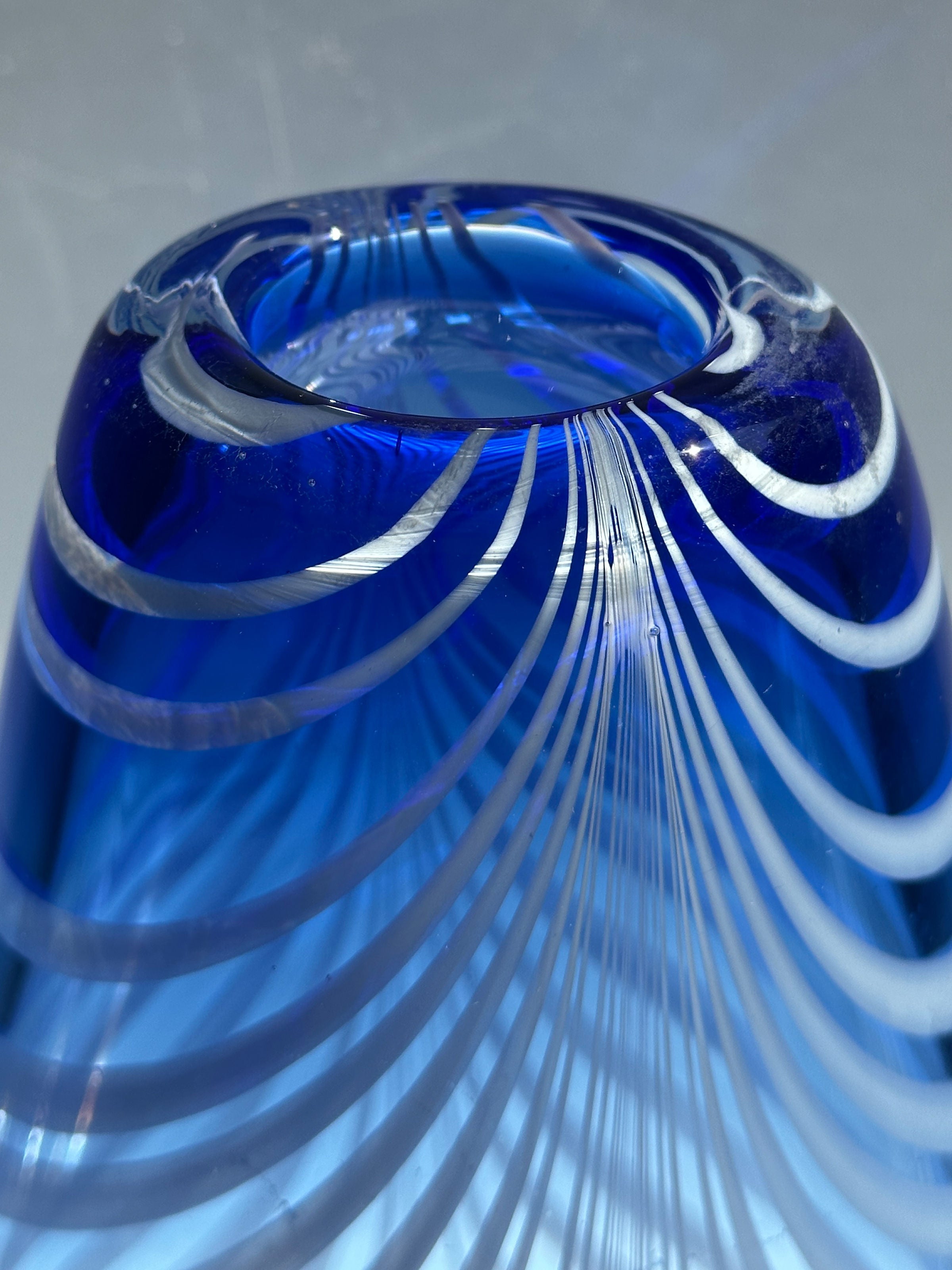 Bohemian cobalt blue art glass vase with white swirl pattern detail