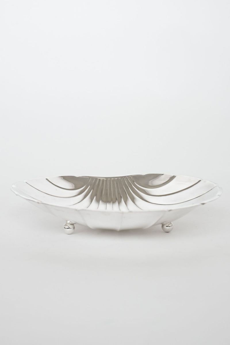 Large silverplated shell-shaped decorative dish on three legs