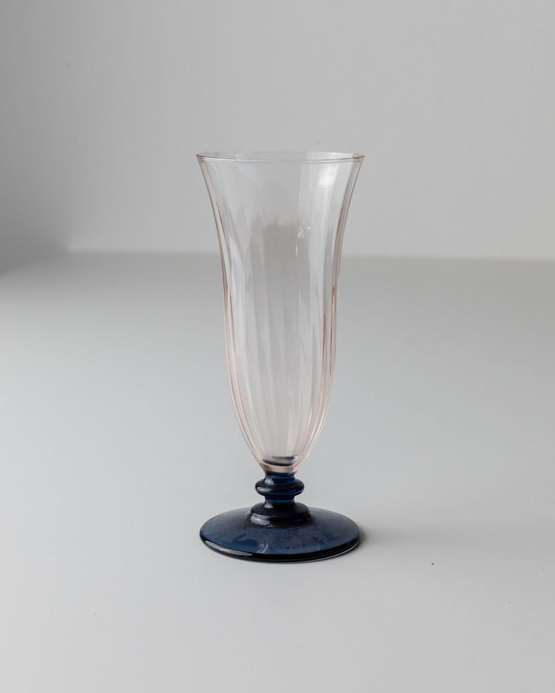 Single pink Murano glass flute with blue stem detail view