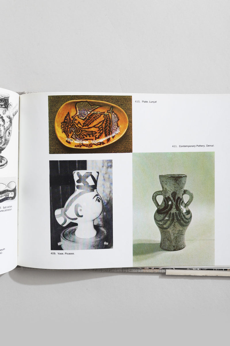 Open art book showing pottery pages with Lurçat plate and Picasso vase