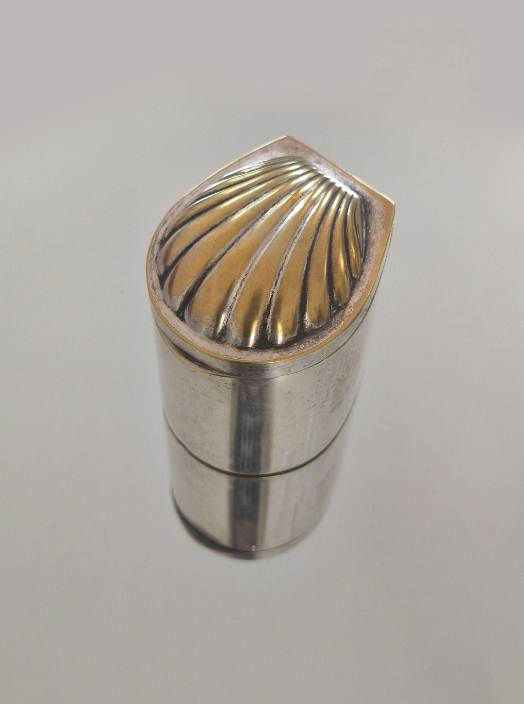 Silver shell-shaped decorative box with ribbed patina finish
