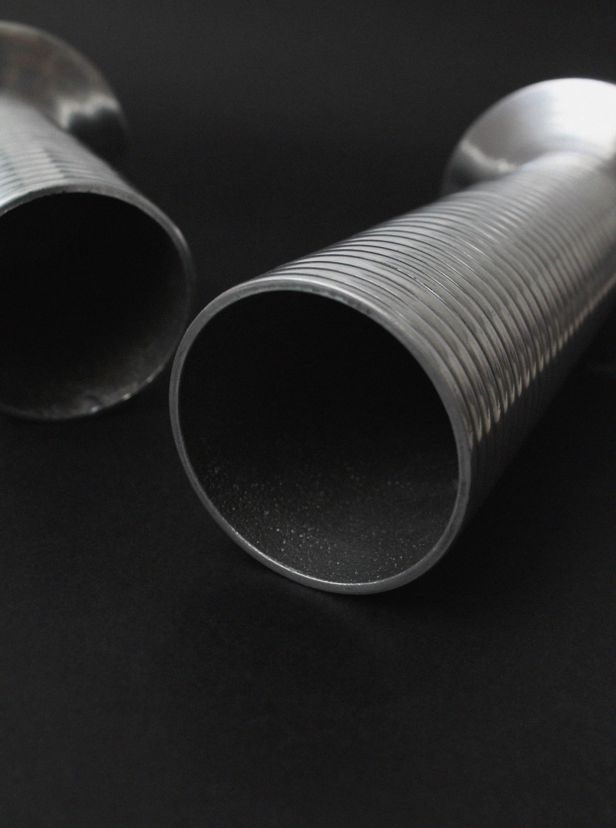Pair of Aluminum Vases